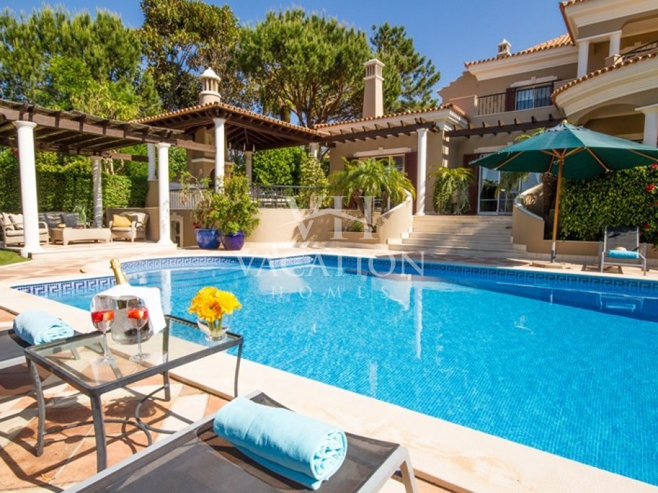 This Luxury villa stands in landscaped gardens with views to the golf course. 