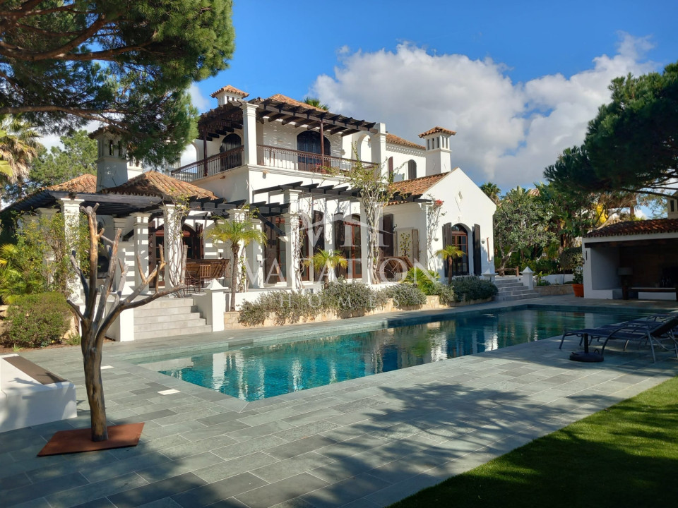 Beautiful hacienda style property adjoining San Lorenzo Golf course.